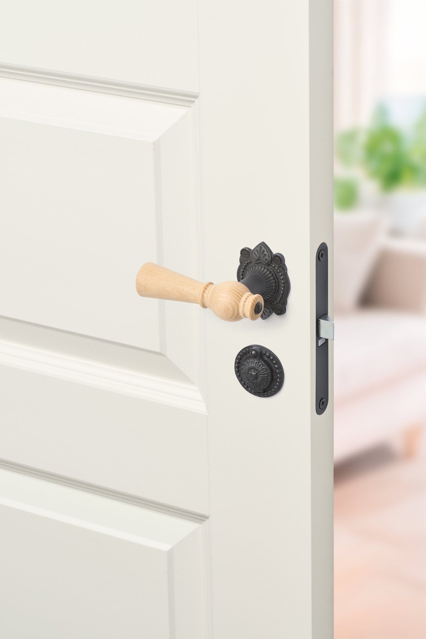 Østerbro | Dørhåndtag i Asketræ med almue rosetter og nøgleskilte i Sort Oxideret Messing L 111 mm (C/C 30 mm) Sibes ØB-AS-1670-OX FINICC