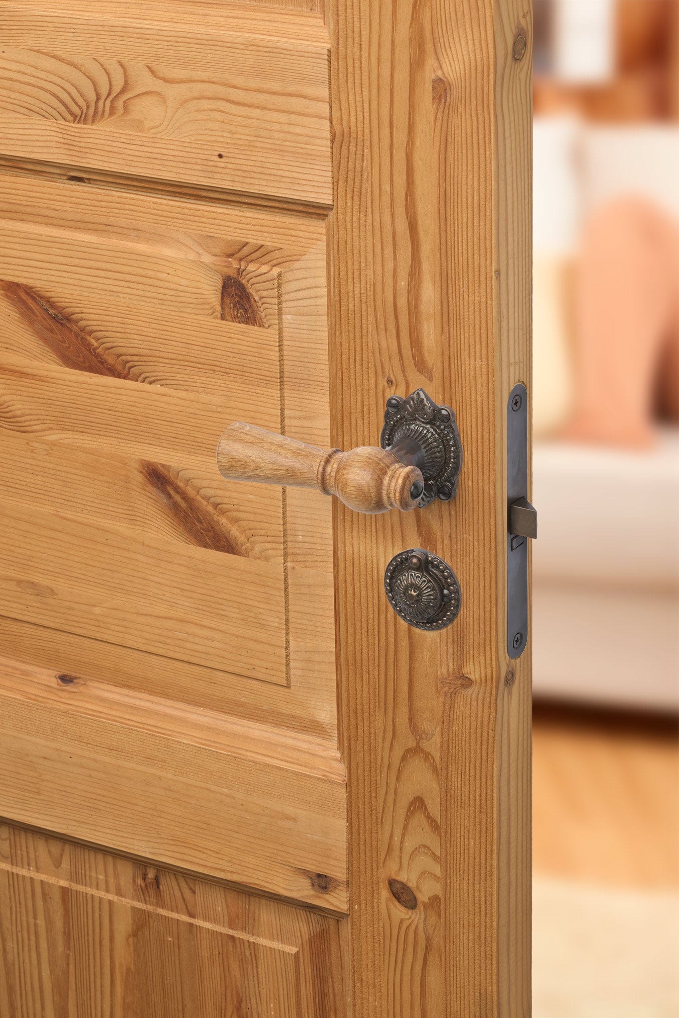 Østerbro | Dørhåndtag i Egetræ med almue rosetter og nøgleskilte i Bruneret Messing L 111 mm (C/C 30 mm) Sibes ØB-EN-1670-BB FINICC