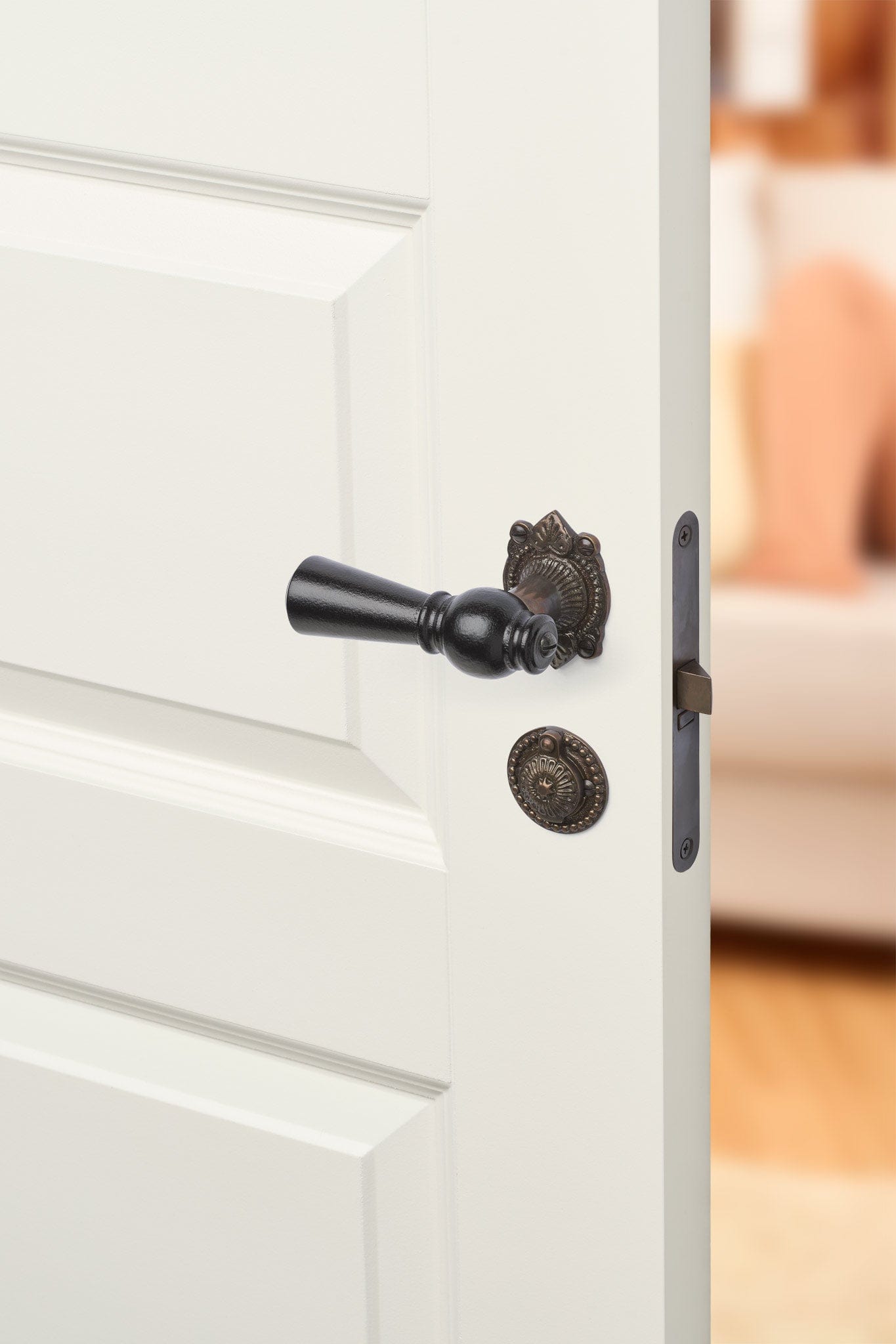 Østerbro | Dørhåndtag i Sortlakeret træ med almue rosetter og nøgleskilte i Bruneret Messing L 111 mm (C/C 30 mm) Sibes ØB-SO-1670-BB FINICC