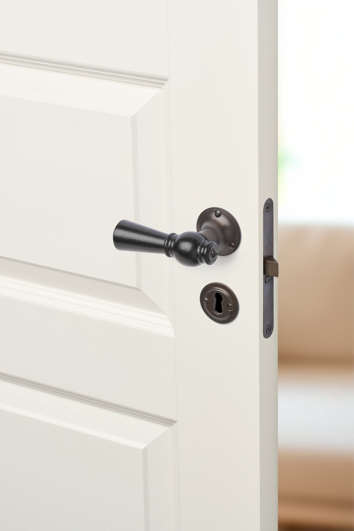 Østerbro | Dørhåndtag i Sortlakeret træ med klassiske rosetter og nøgleskilte i Bruneret Messing L 111 mm (C/C 30 mm) Sibes ØB-SO-1770-BB FINICC