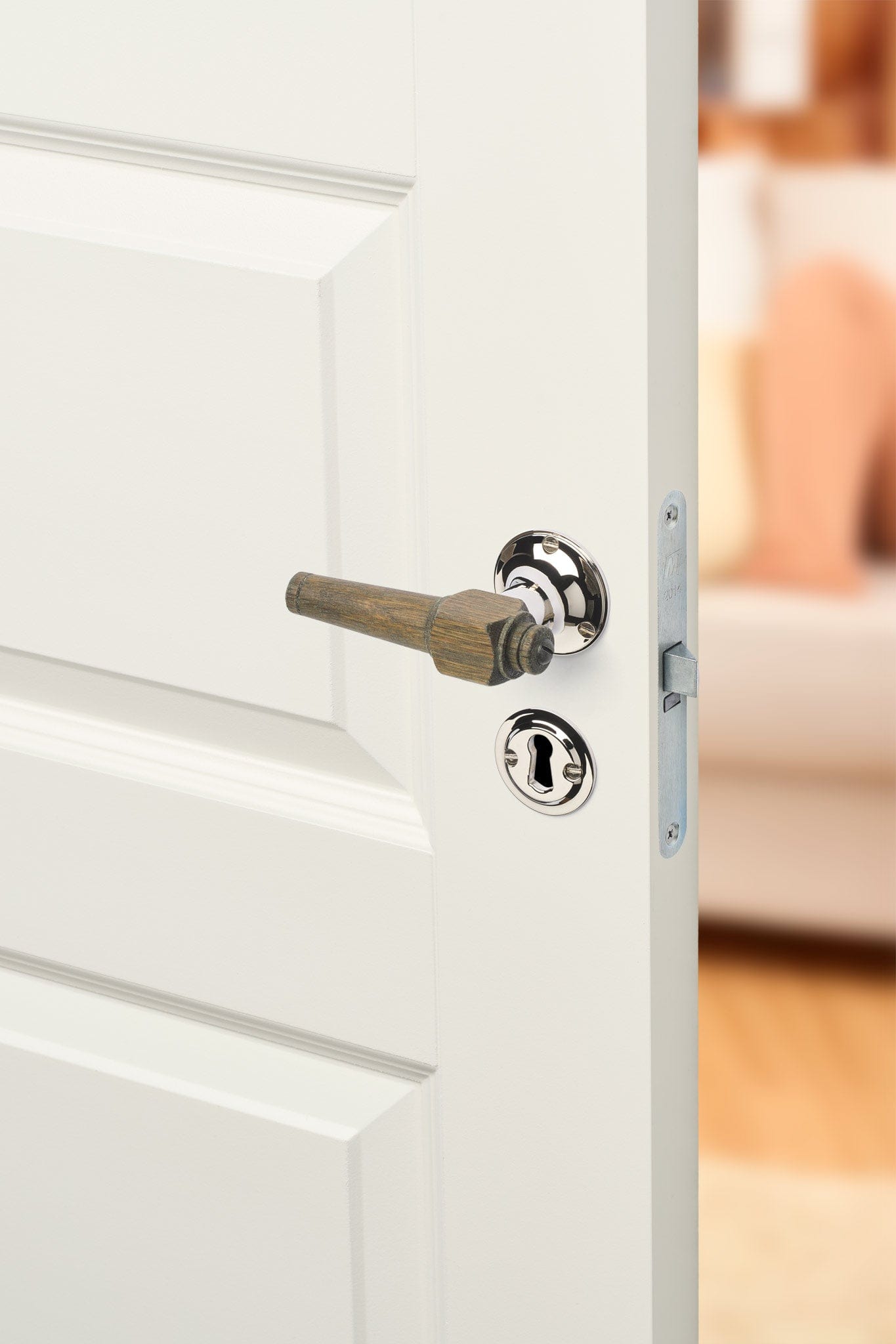 Svanemølle | Dørhåndtag i Røget Eg med klassiske rosetter og nøgleskilte i Blank Nikkel L 111 mm (C/C 30 mm) Sibes SM-ER-1770-NI FINICC