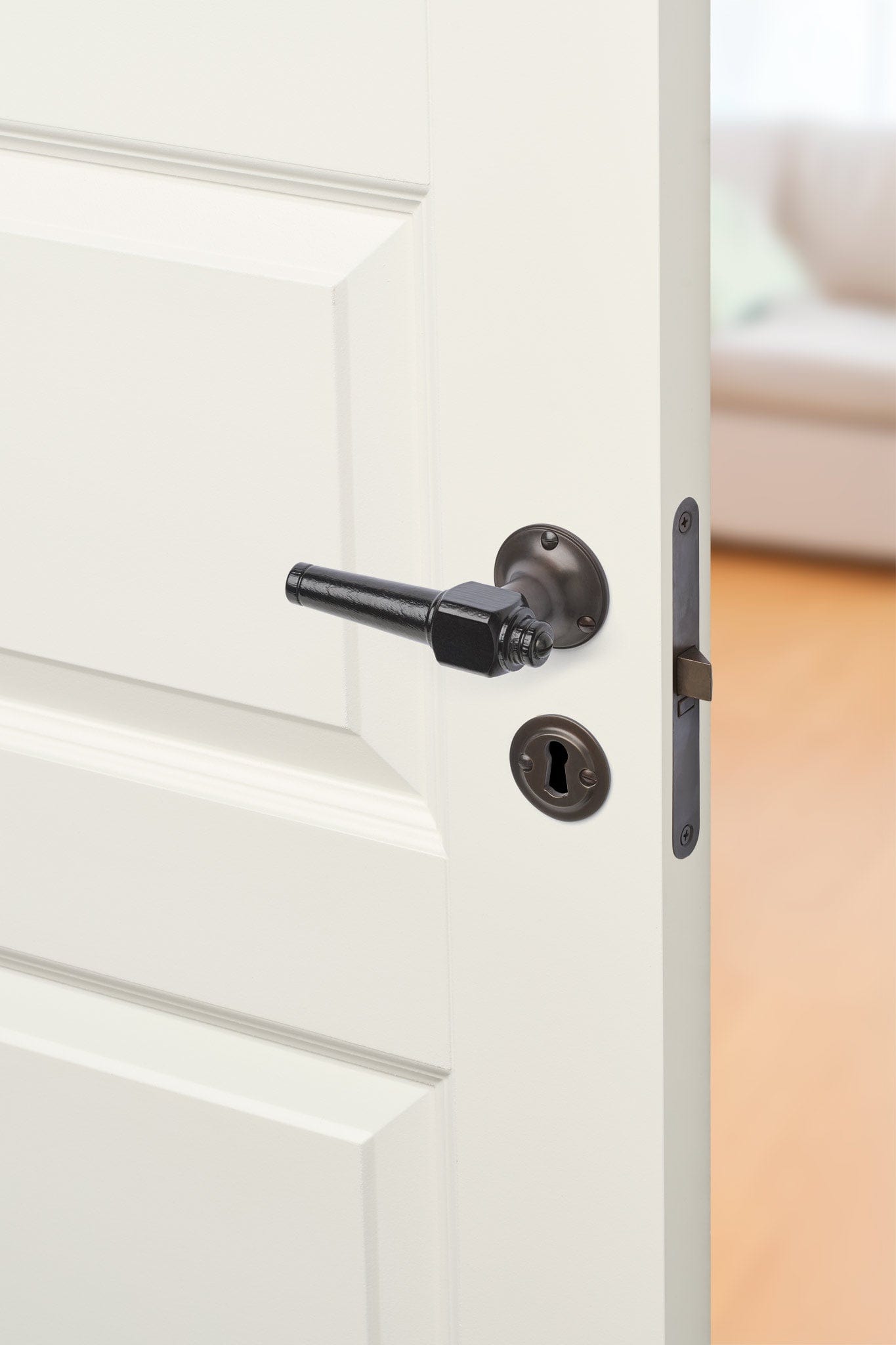 Svanemølle | Dørhåndtag i Sortlakeret træ med klassiske rosetter og nøgleskilte i Bruneret Messing L 111 mm (C/C 30 mm) Sibes SM-SO-1770-BB FINICC